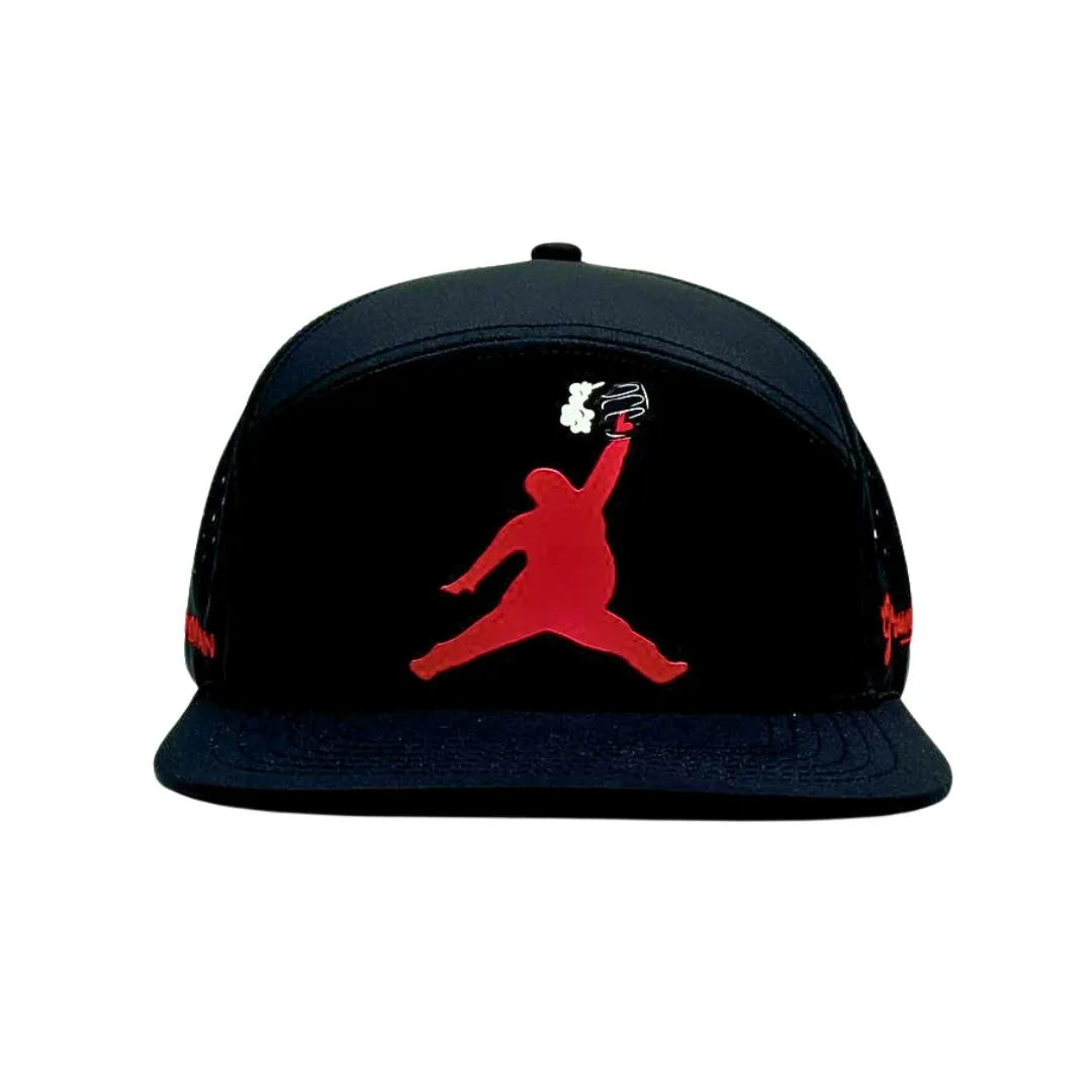 The Grunk Dolfer Black ChunkMan Hat is a moisture-wicking snapback featuring a bold red silhouette of a basketball player jumping with a burger, inspired by the classic Air Jordan logo—perfect for sporty style with a twist.