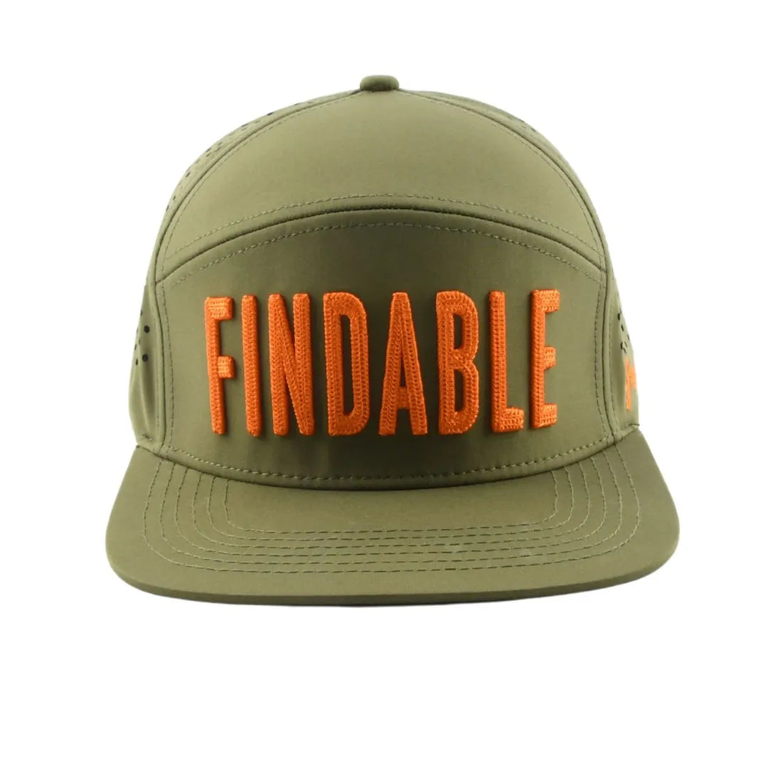 The Grunk Dolfer Green Findable Hat is a khaki green golf snapback with "FINDABLE" embroidered in bold orange on the front.