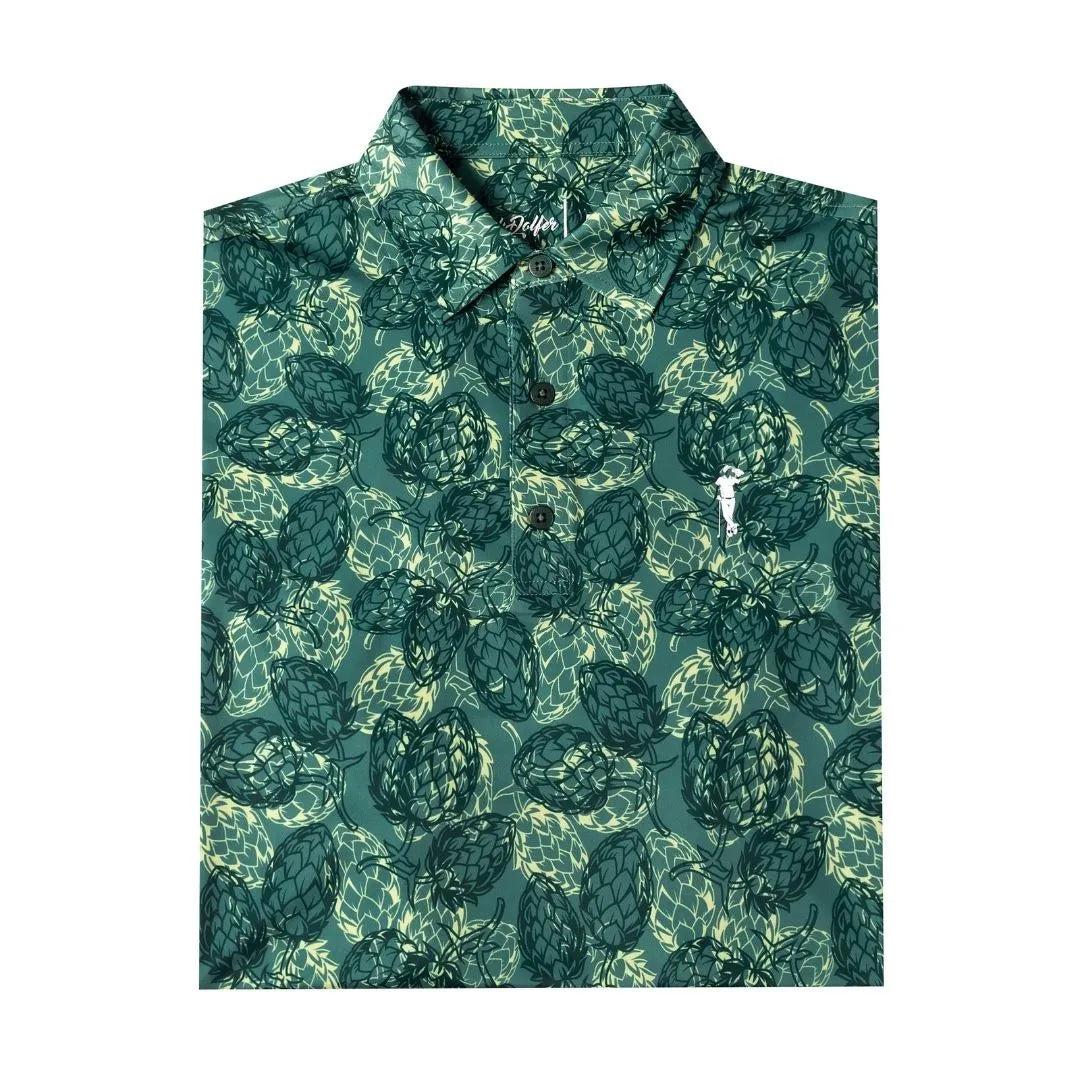 The Grunk Dolfer Hopsy is a neatly folded short-sleeve collared polo with a green and navy artichoke pattern, button-down front, small white embroidered left chest logo—crafted especially for Grunk Dolfer enthusiasts.