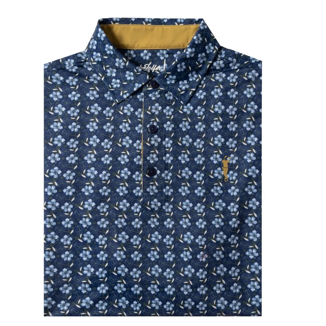 The Grunk Dolfer Stitched Hawaiian is a navy collared shirt with a white and light blue floral pattern, three dark buttons, a yellow collar accent, and a small yellow logo on the left chest for tropical-meets-office style.