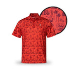 The Grunk Dolfer "Red Hawaiian" polo features a bright red color, short sleeves, collar, and an all-over black tropical print with palm trees, waves, and island scenes—ideal for your next Hawaiian golfing day. Circular close-up shows the intricate pattern.