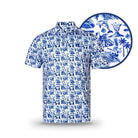 The Grunk Dolfer White Hawaiian is a short-sleeve button-up golf polo with a white background and intricate blue print featuring surfers, palm trees, and waves; close-up inset reveals the detailed design pattern.