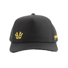 The Grunk Dolfer Shotty Hat is a black streetwear cap with a yellow crown logo on the front left and yellow script on the side. It features a structured front panel and perforated sides for added style and comfort.