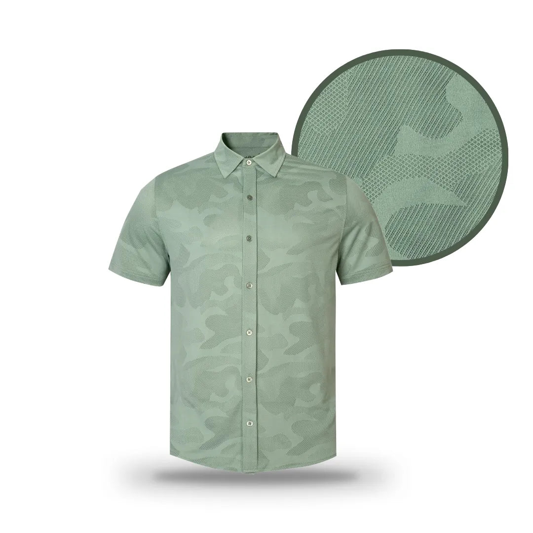 The Grunk Dolfer Closet Grunk Button Down Green features short sleeves, light green color with a subtle camo pattern, and a fabric close-up highlighting its unique texture and style in this men's shirt.