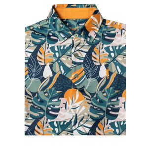 The Grunk Dolfer Tropic Vibes Polo features a vibrant tropical leaf print in green, blue, orange, and cream, a contrasting orange inner collar, and performance fabric for all-day comfort.