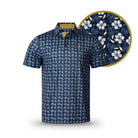 The Grunk Dolfer Stitched Hawaiian is a navy blue short-sleeve polo featuring a detailed blue, white, and gold floral pattern—elegant enough for the office and highlighted in a circular close-up of its tropical print.