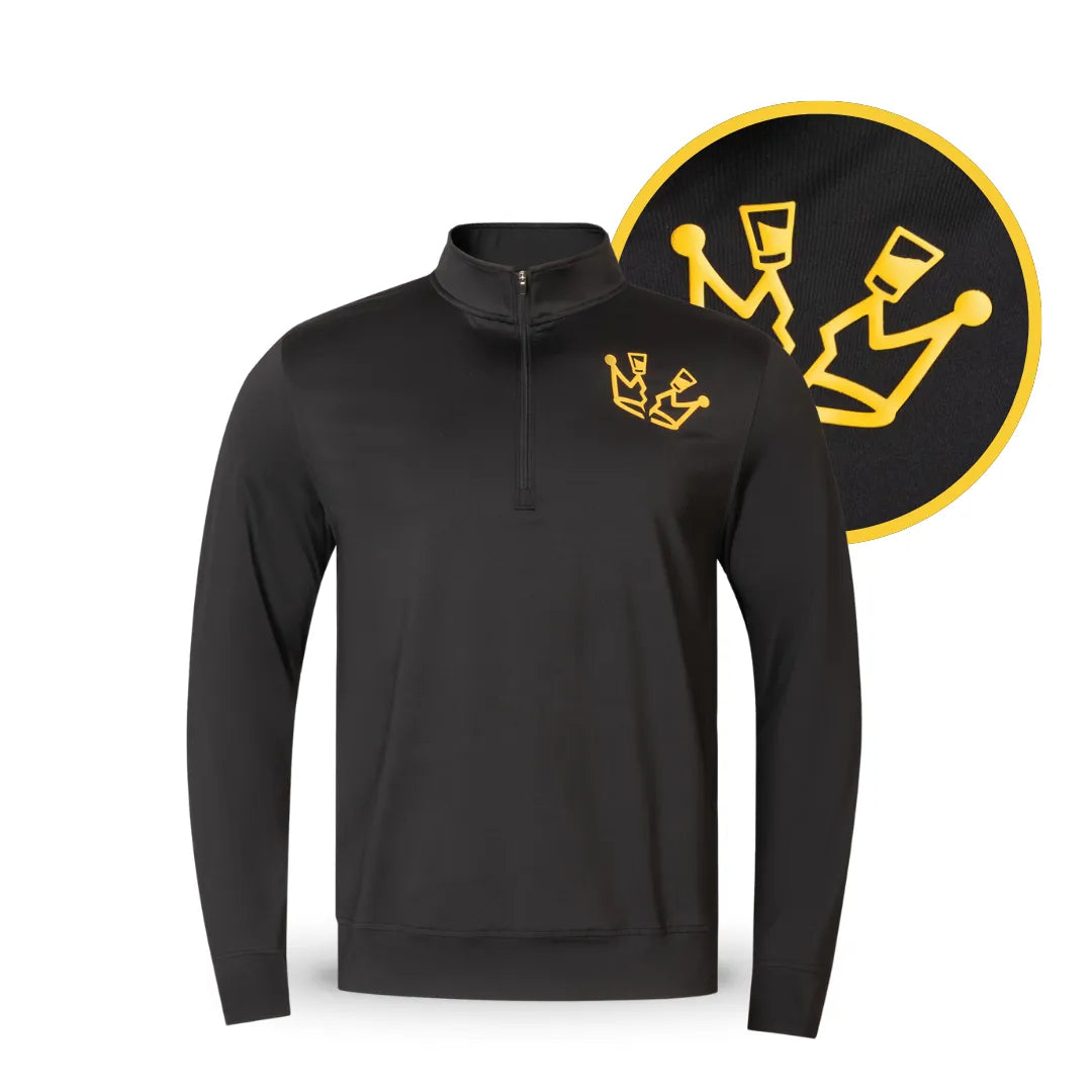 The Grunk Dolfer Black Shotty Q-Zip is a black pullover with a gold crown logo on the left chest, merging streetwear and luxury. An enlarged crown logo in a yellow circle is shown beside the pullover.