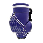 A purple Grunk Dolfer Blue Drinking Sport Den Caddy featuring a white pocket with a repeating navy blue logo pattern and a black shoulder strap.