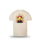 The Bogey Watch Tee by Grunk Dolfer is a beige golf shirt featuring a back graphic of a sunset, palm trees, and golf cart with "Chick Waters Golf and Surf Club" text. Made from soft recycled polyester for all-day comfort.