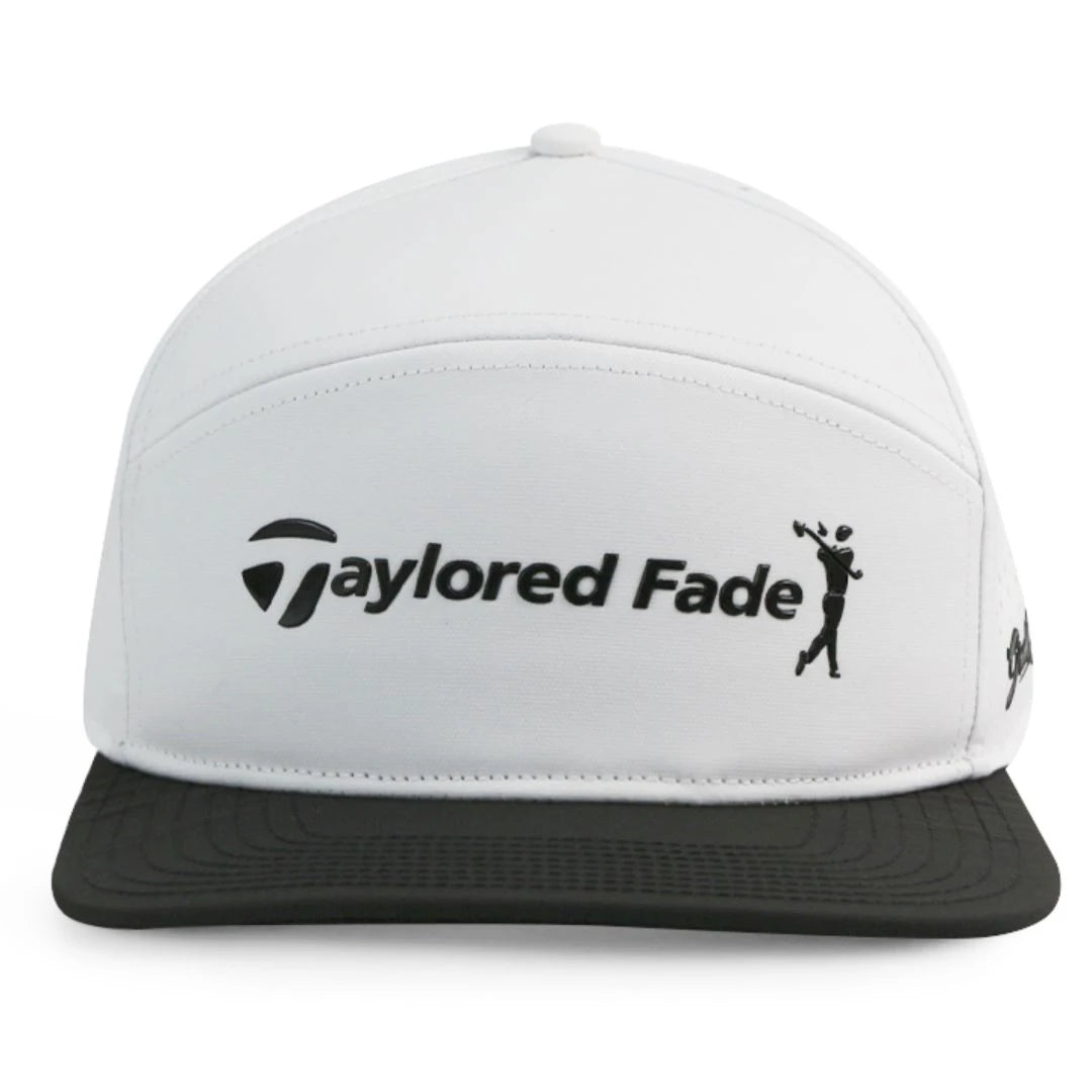 The Grunk Dolfer Taylored Fade is a white and black performance golf hat with a golfer silhouette logo in black and an adjustable snapback for the perfect fit.