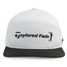 The Grunk Dolfer Taylored Fade is a white and black performance golf hat with a golfer silhouette logo in black and an adjustable snapback for the perfect fit.