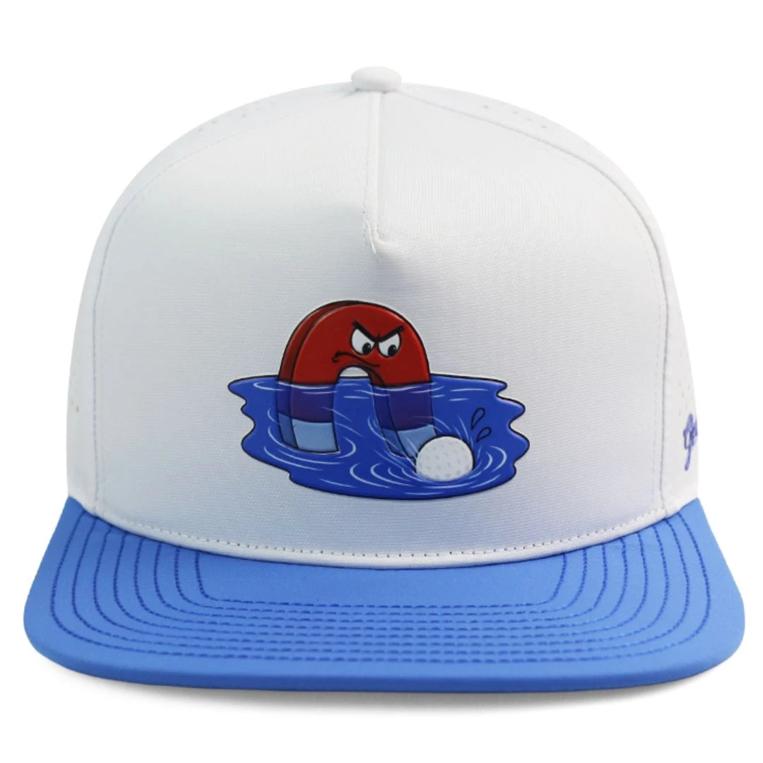 The Grunk Dolfer Water Hazard Hat is a white and blue golf hat with an angry red horseshoe magnet in water attracting a golf ball—eye-catching and water-resistant for bold players.
