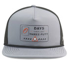 The Grunk Dolfer Workplace Hazard Hat is a gray and black cap featuring a 0 DAYS SINCE LAST THREE-PUTT patch with golf ball and red warning icon—perfect for golfers or your next office hazard.
