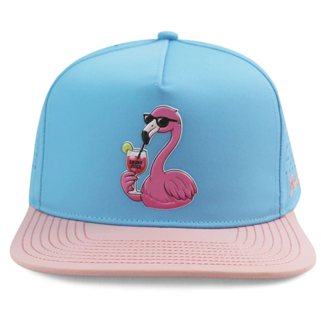 The Grunk Dolfer GrunkMingo Hat is a blue and pink performance golf hat featuring a cartoon flamingo with sunglasses and a drink with lime—your next favorite on the course.