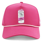 The Grunk Dolfer Grunk Claw Hat is a bright pink golf hat with a white graphic hard seltzer can patch labeled Black Cherry 5%, plus a thin white cord across the brim.