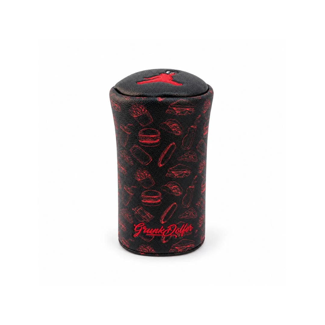 The Red Chunkman Barrel Fairway Wood Cover by Grunk Dolfer features playful burger, fries, and drink illustrations in black and red. “Grunk Dolfer” is written at the bottom in red with a red golfer silhouette above. Crafted from premium faux leather, this stylish headcover offers superior protection for your fairway wood.