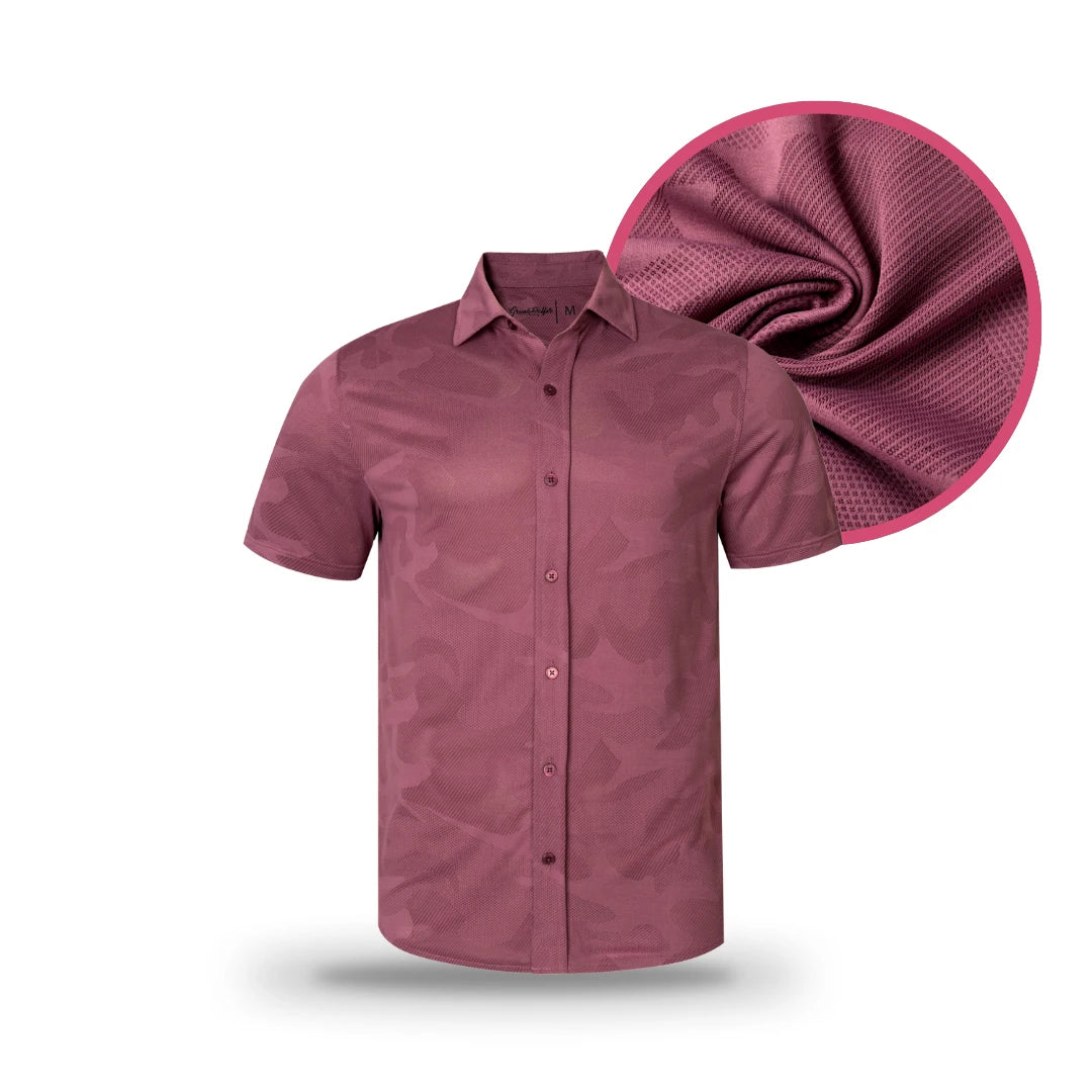 Front-facing view of the Grunk Dolfer Dusty Mauve Button Down, a short-sleeve shirt featuring a subtle camouflage jacquard pattern. Inset highlights a close-up of the fabric’s texture and weave.