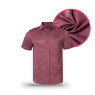 Front-facing view of the Grunk Dolfer Dusty Mauve Button Down, a short-sleeve shirt featuring a subtle camouflage jacquard pattern. Inset highlights a close-up of the fabric’s texture and weave.