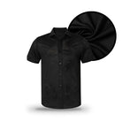 A short-sleeve Black Button Down by Grunk Dolfer with a pointed collar, shown in front of a close-up fabric swatch that highlights its smooth black texture—ideal for anyone looking for a sleek and versatile black button-up shirt.