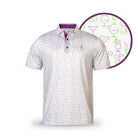 The Grunk Dolfer Happy Hour Polo is a white, short-sleeve shirt with light pink and green cocktail glass prints, purple buttons, and collar trim. A circular close-up highlights the playful drink pattern—ideal for golf outings or drinks.