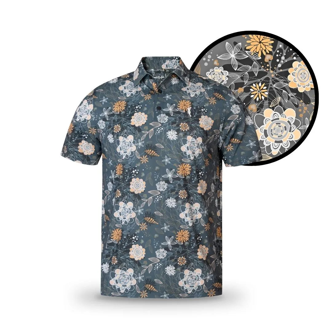 The Grunk Dolfer Harvest Fairway is a short-sleeve button-up shirt with grey, white, soft orange, and beige floral patterns on a dark background—detailed flower and leaf designs make it a perfect fall wardrobe upgrade.