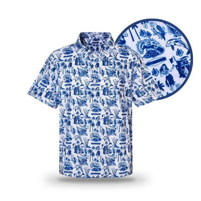 The Grunk Dolfer Kids White Hawaiian is a short-sleeve button-up with blue tropical palm, bird, and island prints on white. A circular inset highlights the detailed print—ideal for matching family outfits.