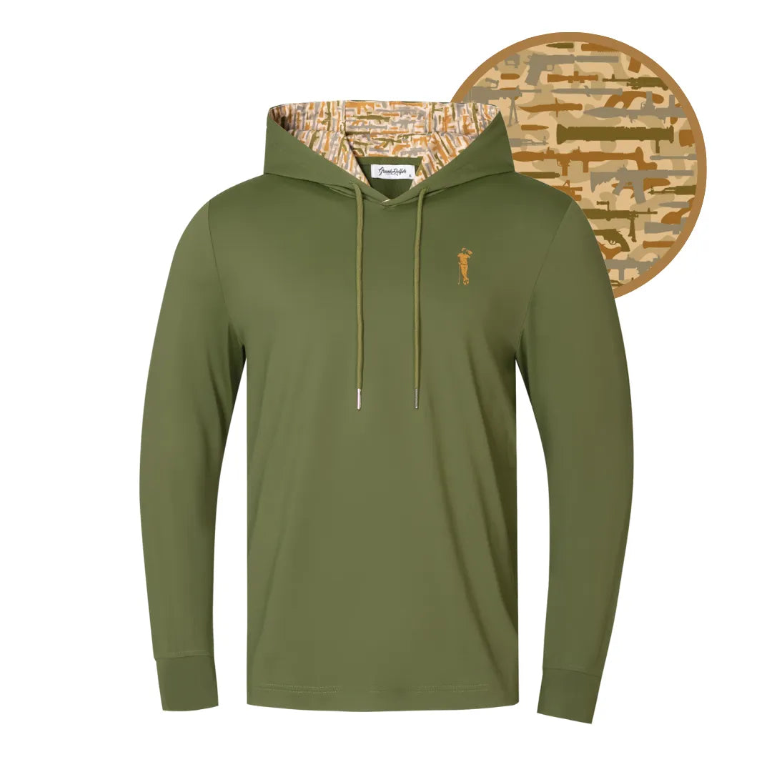 The Grunk Dolfer Desert Gamo Hoodie is an olive green heavyweight hoodie with a drawstring hood. The hood’s lining and small chest logo display a tan and brown camouflage, as shown in a close-up next to the army green hoodie.