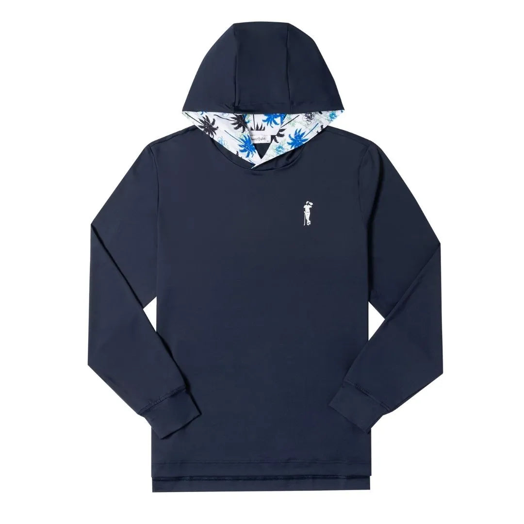 The Grunk Dolfer Fairway Palm Hoodie is a navy performance hoodie with a small white left-chest logo and a blue, black, and white leaf-patterned hood lining. Lightweight and breathable, it’s ideal for golf or casual wear.