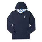 The Grunk Dolfer Fairway Palm Hoodie is a navy performance hoodie with a small white left-chest logo and a blue, black, and white leaf-patterned hood lining. Lightweight and breathable, it’s ideal for golf or casual wear.