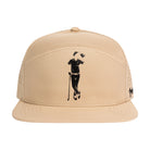 The Tan Grunk Hat by Grunk Dolfer is a beige baseball cap featuring a black golfer silhouette on the front, perforated side panels, and a flat brim—combining comfort and style for any occasion.