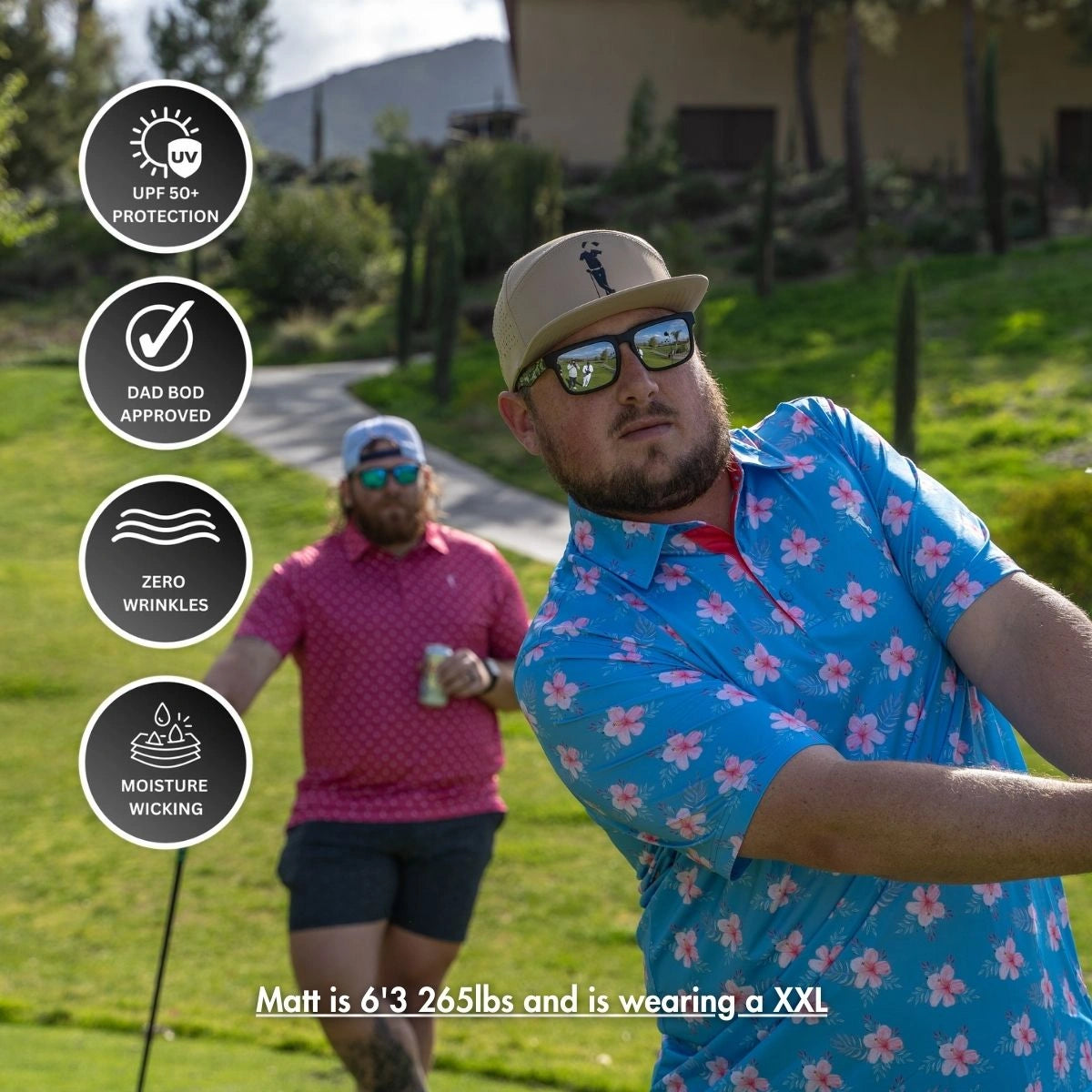 Two men golf outside on a lush course. Up front, one swings a club in the Grunk Dolfer Hibiscus Hitter blue and pink floral shirt, sunglasses, and beige cap. Icons show features; text: Matt is 6'3", 265 lbs, wearing XXL.