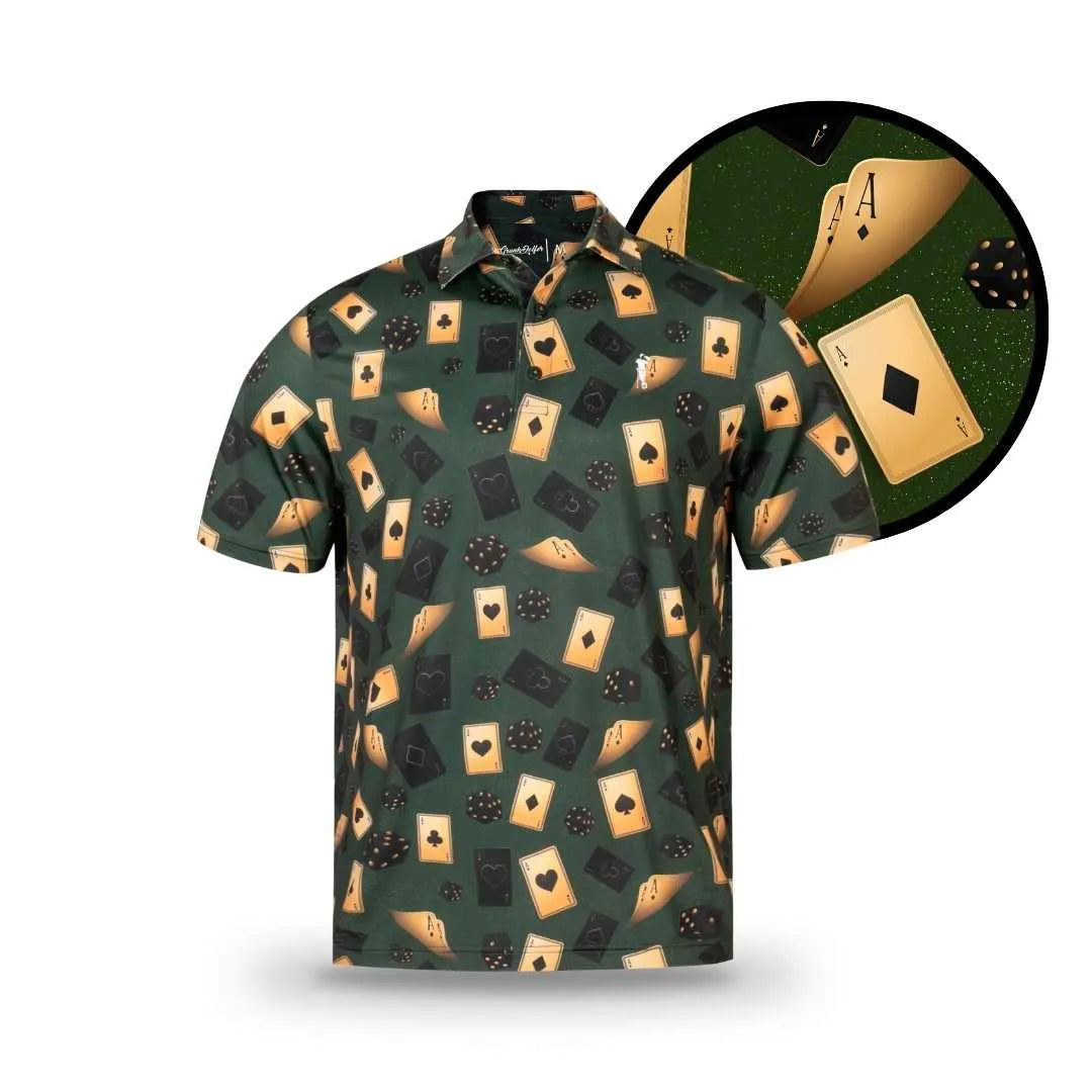 The Vegas Nights polo by Grunk Dolfer is a short-sleeved golf shirt with a green background featuring an all-over print of black and gold playing cards and dice, highlighted by a close-up of the ace of spades.