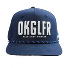 The Grunk Dolfer OKGLFR Hat is a navy blue snapback with bold white OKGLFR lettering, EXCELLENT DRINKER beneath, and a decorative white-and-blue cord above the brim—a perfect stylish pick for golfers.