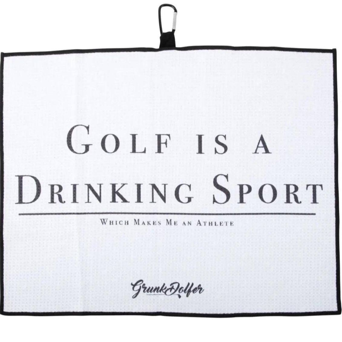 The Golf is a Drinking Sport Towel by Grunk Dolfer is a white waffle microfiber towel with black text, black border, GrunkGolfer logo, and a handy hook for hanging. Text reads: Golf is a Drinking Sport. Which Makes Me an Athlete.