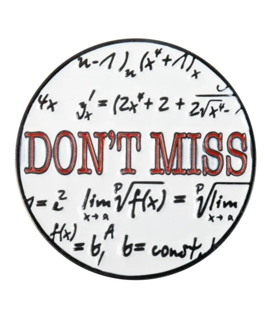 The Grunk Dolfer Dont Miss Ball Marker is a circular pin with black mathematical equations and bold red DONT MISS text at the center, perfect as a golf gift. Includes a magnetic hat clip.